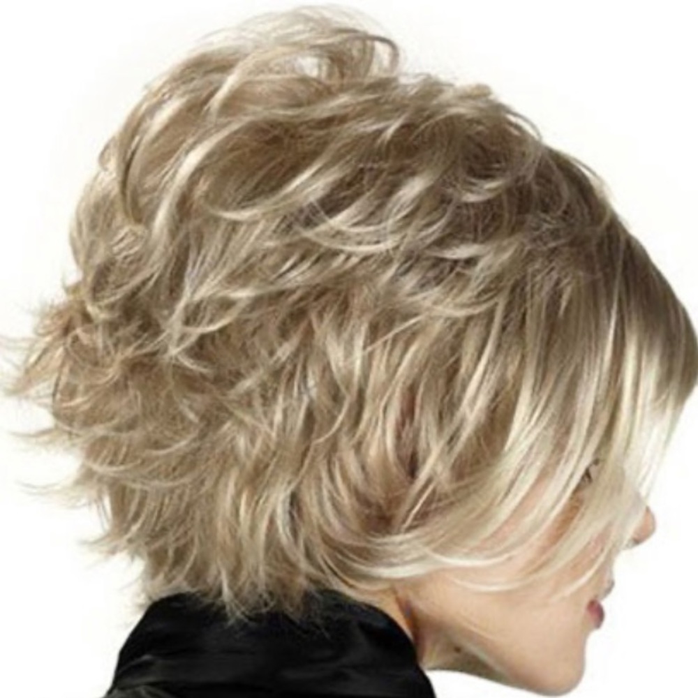 New unworn synthetic wig.  Short sassy style. - Picture 2 of 5